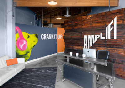 AmpliFi Advertising headquarters welcome wall