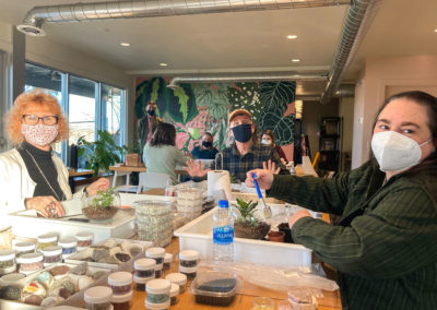 AmpliFi people building terrariums at Fern Plant Shop